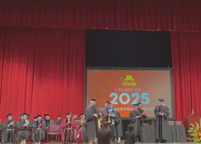 Crossing the graduation stage with my son