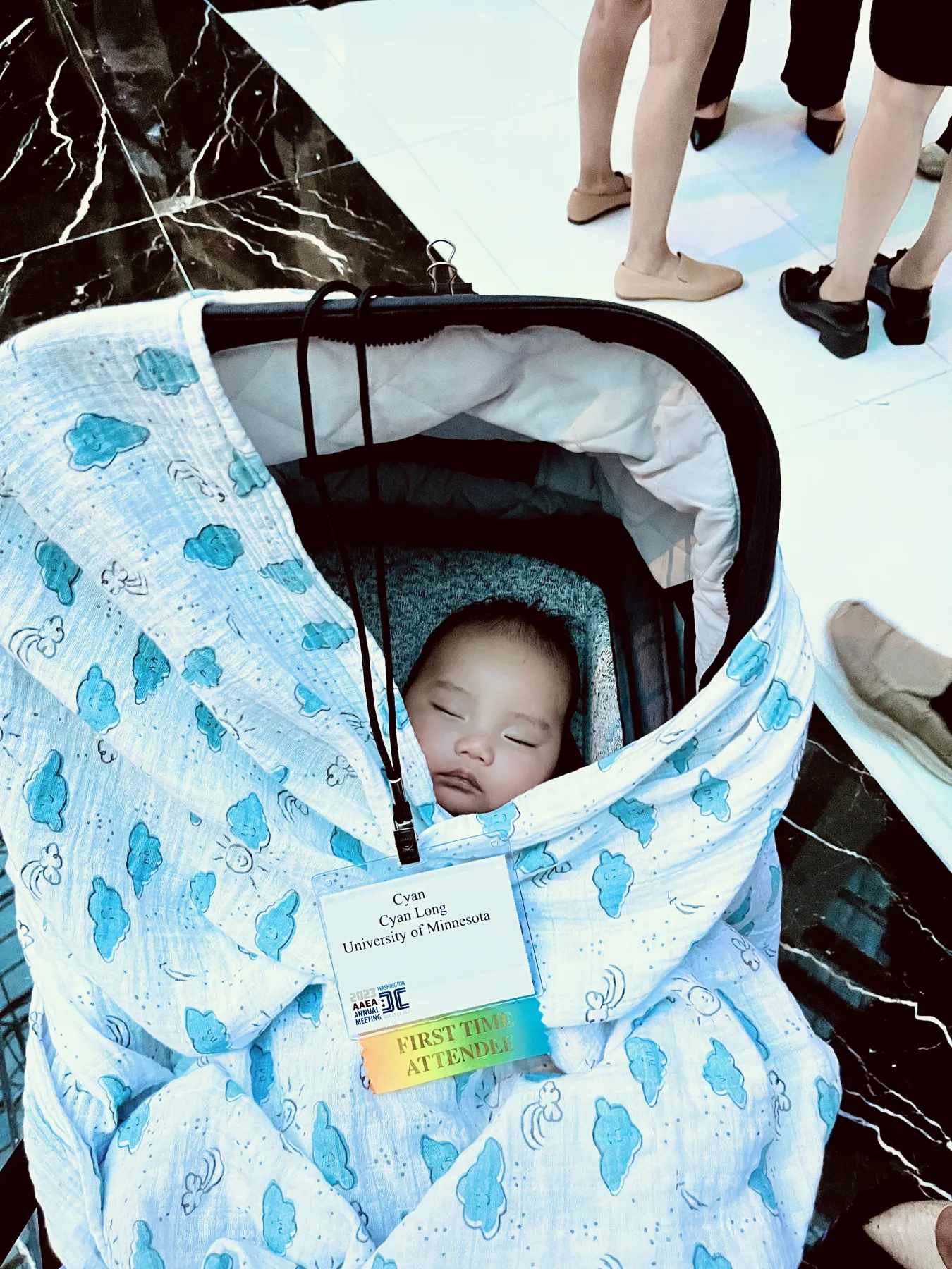 Yanxu Long's son attending his first AAEA Annual Meeting in 2023
